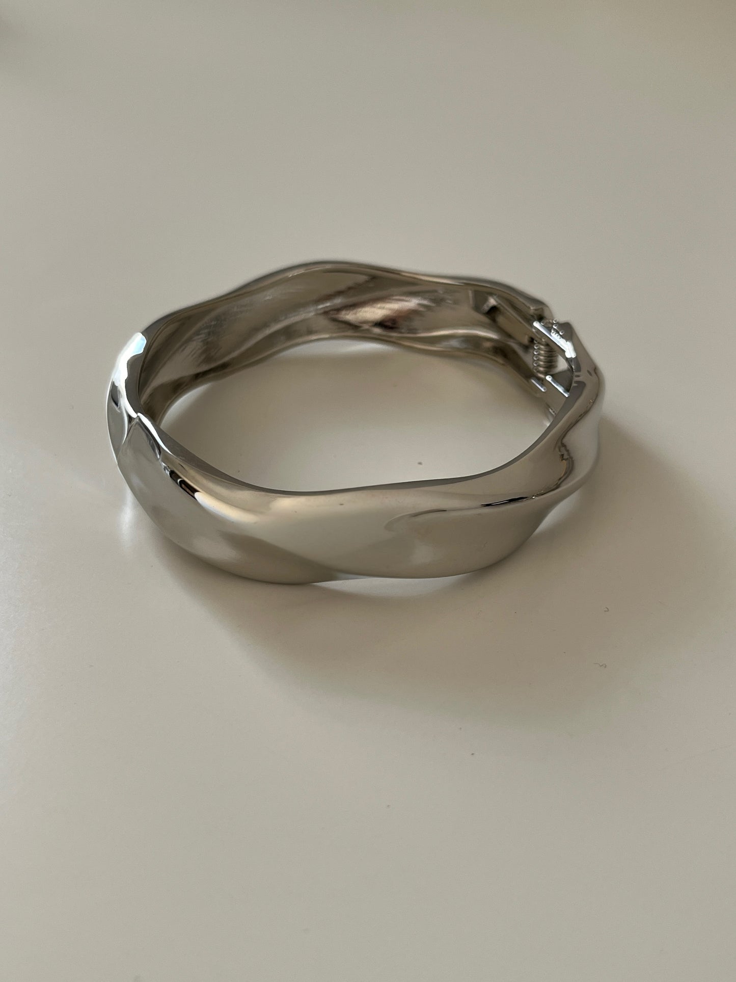 Twist Silver Bangle